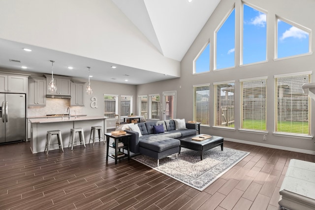 6303 Grand Drift Ct, Katy, TX 77494 - living area with dark wood finished floors, recessed lighting, and high vaulted ceiling