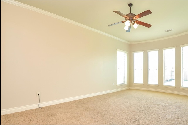 8706 Stowe Creek Ln, Missouri City, TX 77459 - spare room featuring light carpet, ornamental molding, healthy amount of natural light, and a ceiling fan