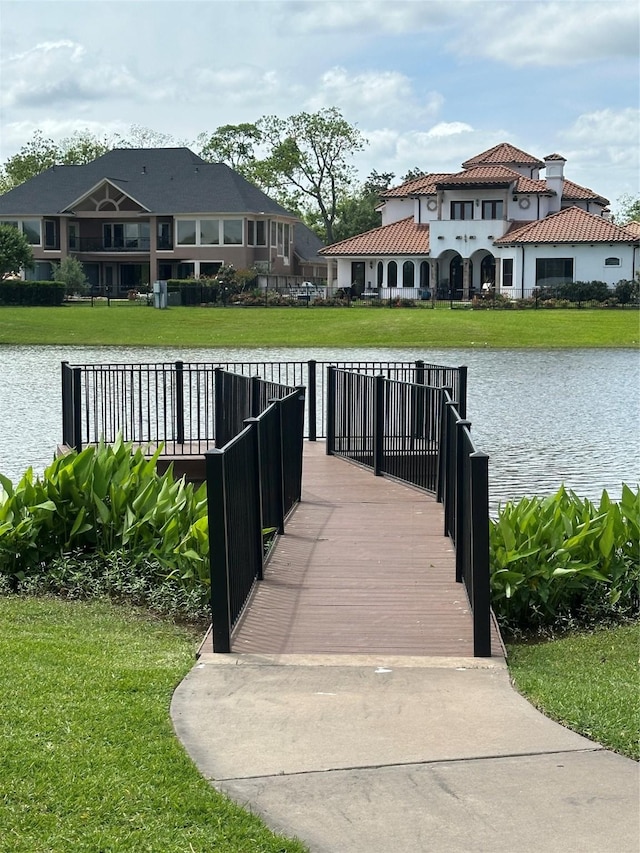 8706 Stowe Creek Ln, Missouri City, TX 77459 - dock with a water view and a lawn