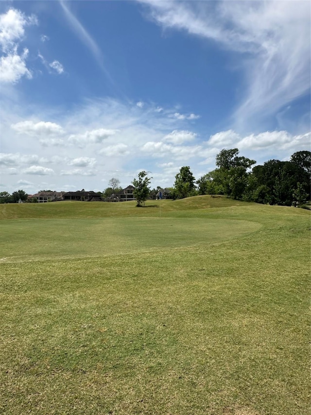 8706 Stowe Creek Ln, Missouri City, TX 77459 - view of property's community with view of golf course and a yard