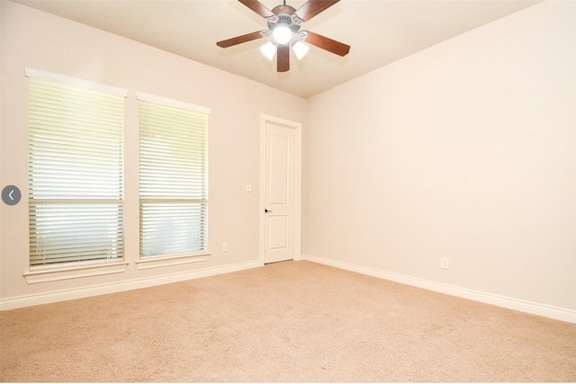 8706 Stowe Creek Ln, Missouri City, TX 77459 - empty room with light carpet and ceiling fan
