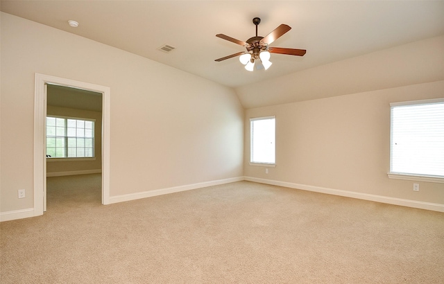 8706 Stowe Creek Ln, Missouri City, TX 77459 - empty room with a ceiling fan, light colored carpet, lofted ceiling, and a smoke detector