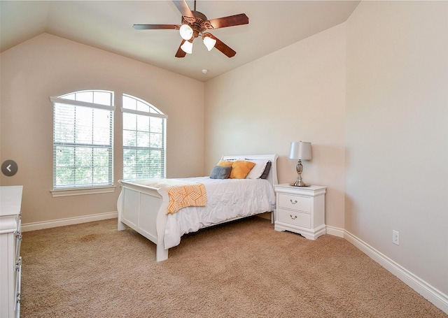 8706 Stowe Creek Ln, Missouri City, TX 77459 - bedroom featuring vaulted ceiling, light carpet, and ceiling fan