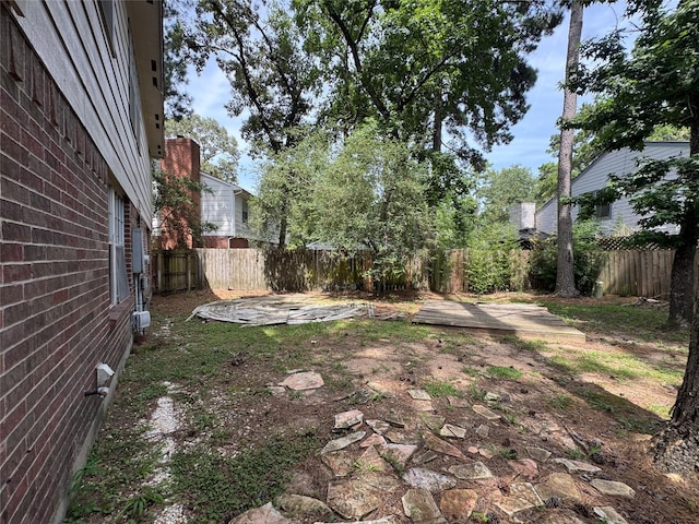 3 Ridgeline Ct, The Woodlands, TX 77381 - fenced backyard with a patio area