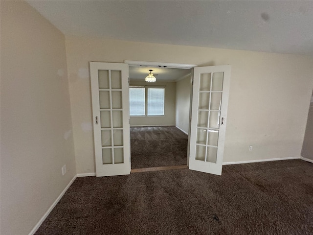 3 Ridgeline Ct, The Woodlands, TX 77381 - carpeted spare room with french doors and baseboards