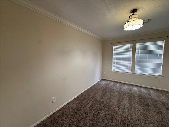 3 Ridgeline Ct, The Woodlands, TX 77381 - spare room featuring carpet floors, ornamental molding, and a textured ceiling