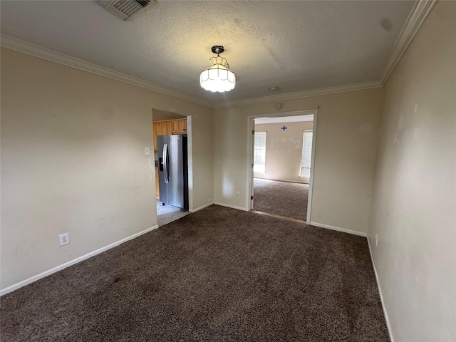 3 Ridgeline Ct, The Woodlands, TX 77381 - carpeted empty room featuring crown molding and a textured ceiling