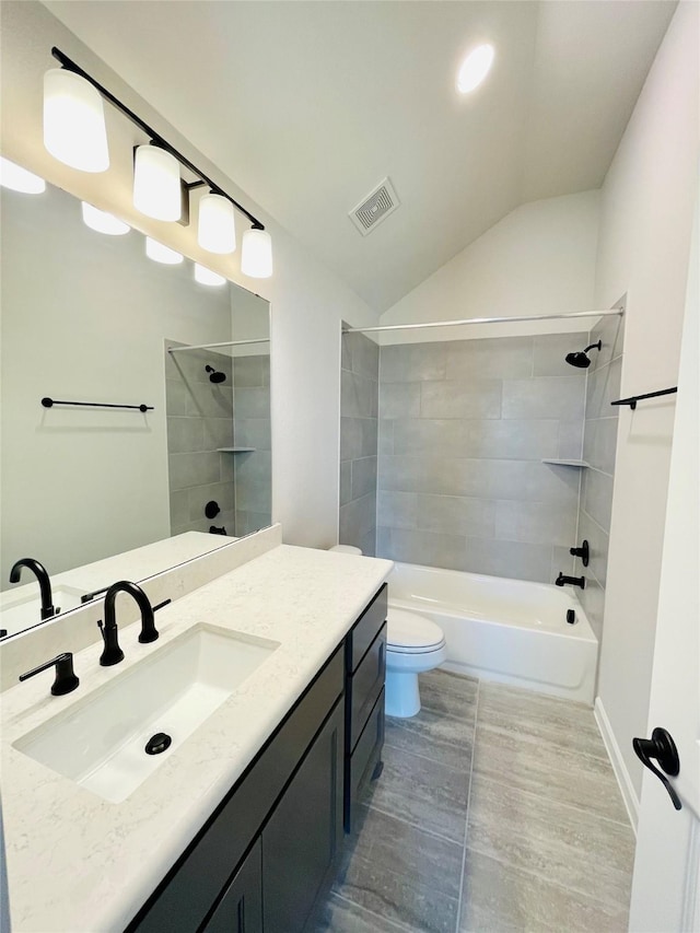 669 Cape Capri Dr, Katy, TX 77493 - full bath with vanity, lofted ceiling, shower / washtub combination, and wood finished floors