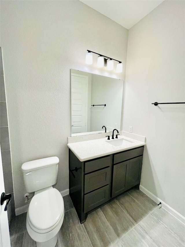669 Cape Capri Dr, Katy, TX 77493 - bathroom featuring wood finished floors and vanity