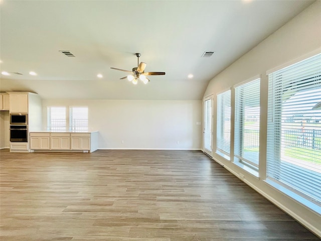669 Cape Capri Dr, Katy, TX 77493 - unfurnished living room with vaulted ceiling, ceiling fan, recessed lighting, and light wood finished floors