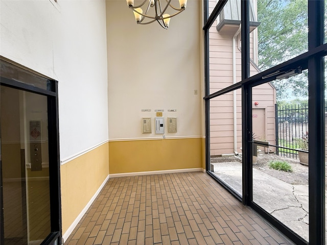 8415 Hearth Dr Unit 36, Houston, TX 77054 - unfurnished sunroom with a chandelier