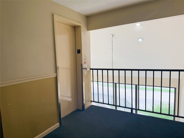 8415 Hearth Dr Unit 36, Houston, TX 77054 - hall with elevator and carpet