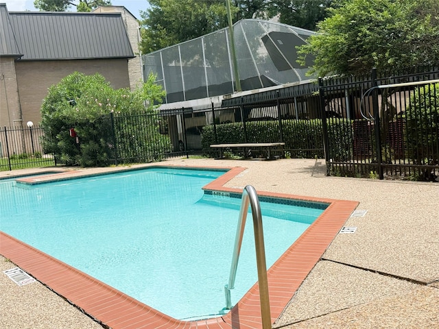 8415 Hearth Dr Unit 36, Houston, TX 77054 - community pool with a patio and glass enclosure