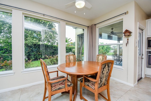 1006 Pointe Loma Dr, Sugar Land, TX 77479 - dining area featuring a ceiling fan and light tile patterned floors