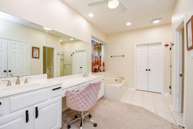 1006 Pointe Loma Dr, Sugar Land, TX 77479 - full bath with vanity, a garden tub, tile patterned floors, a closet, and ceiling fan