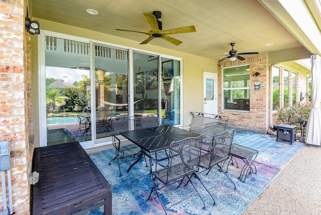 1006 Pointe Loma Dr, Sugar Land, TX 77479 - view of patio featuring a ceiling fan and outdoor dining space