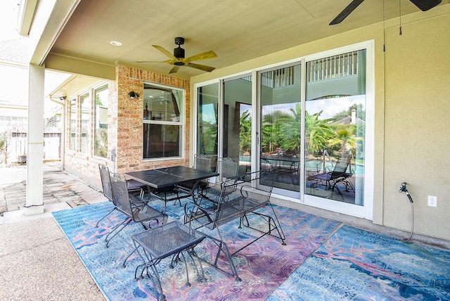 1006 Pointe Loma Dr, Sugar Land, TX 77479 - view of patio / terrace with a ceiling fan and outdoor dining area
