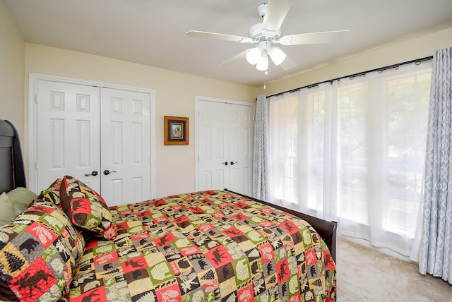 1006 Pointe Loma Dr, Sugar Land, TX 77479 - bedroom with light carpet, multiple windows, and ceiling fan