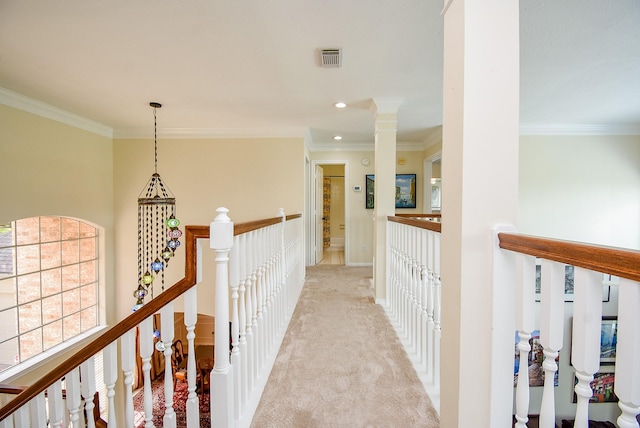 1006 Pointe Loma Dr, Sugar Land, TX 77479 - corridor with ornamental molding, light colored carpet, an upstairs landing, recessed lighting, and decorative columns