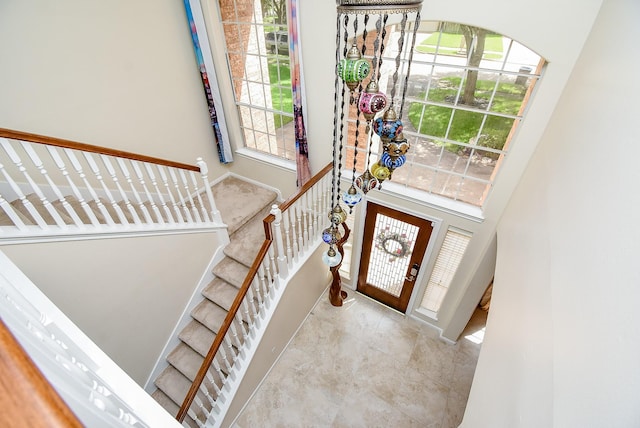 1006 Pointe Loma Dr, Sugar Land, TX 77479 - foyer with stairway and a high ceiling