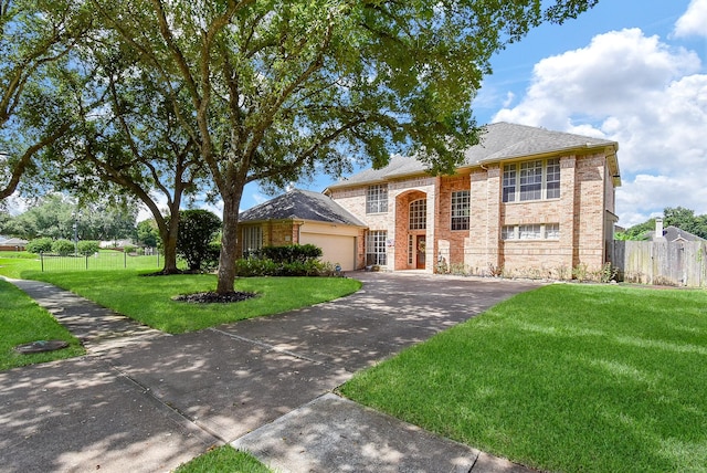 1006 Pointe Loma Dr, Sugar Land, TX 77479 - view of front facade with driveway, brick siding, stone siding, and an attached garage