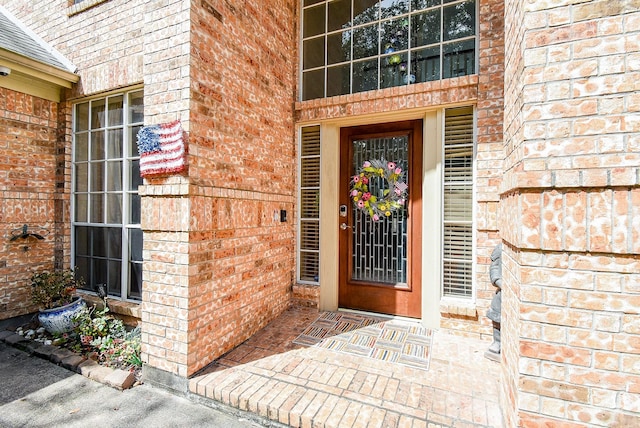 1006 Pointe Loma Dr, Sugar Land, TX 77479 - doorway to property featuring brick siding