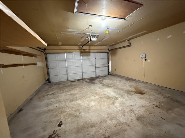 2325 Shady Tree Ln, Conroe, TX 77301 - garage featuring a garage door opener