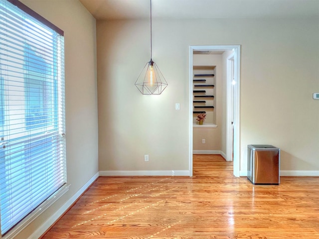2325 Hutchins St, Houston, TX 77004 - unfurnished dining area featuring healthy amount of natural light and light wood-type flooring