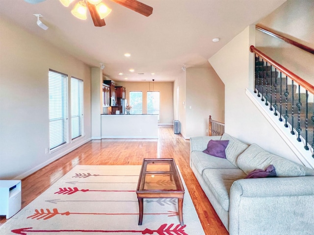 2325 Hutchins St, Houston, TX 77004 - living area with light wood-style floors, ceiling fan, and recessed lighting