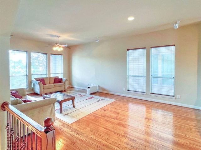 2325 Hutchins St, Houston, TX 77004 - living room featuring a ceiling fan, wood finished floors, and recessed lighting