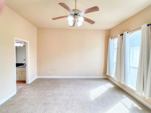 2325 Hutchins St, Houston, TX 77004 - empty room with light colored carpet and a ceiling fan