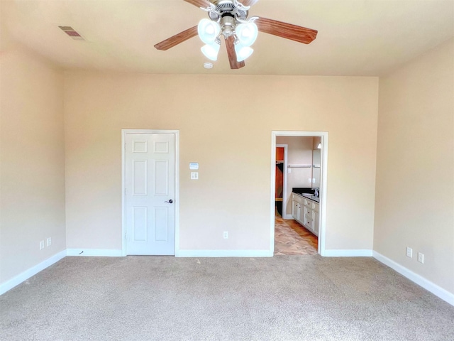2325 Hutchins St, Houston, TX 77004 - unfurnished bedroom with light carpet and ceiling fan