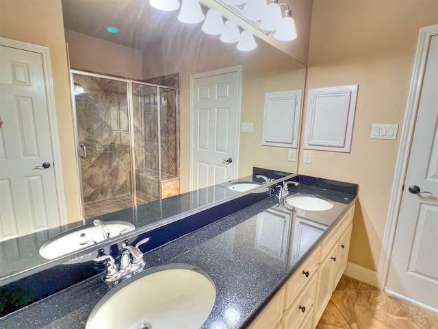 2325 Hutchins St, Houston, TX 77004 - bathroom with double vanity, a stall shower, and marble look tiles