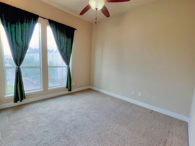 2325 Hutchins St, Houston, TX 77004 - carpeted empty room featuring a ceiling fan and baseboards