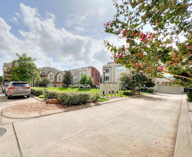 2325 Hutchins St, Houston, TX 77004 - view of road with a residential view, curbs, and street lighting