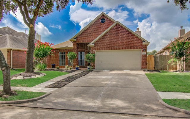 4426 Innsbrook Pl, Sugar Land, TX 77479 - traditional-style home featuring driveway, brick siding, a garage, and a chimney