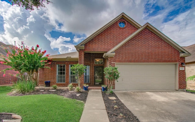 4426 Innsbrook Pl, Sugar Land, TX 77479 - traditional-style home with brick siding, driveway, a front yard, and an attached garage
