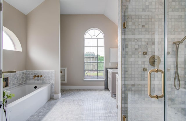 4426 Innsbrook Pl, Sugar Land, TX 77479 - full bath with tile patterned flooring, a bath, vanity, a shower stall, and vaulted ceiling