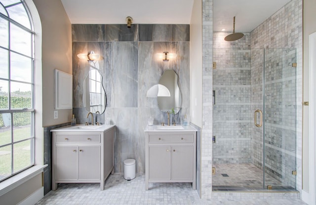 4426 Innsbrook Pl, Sugar Land, TX 77479 - full bath with tile walls, a shower stall, two vanities, and tile patterned flooring