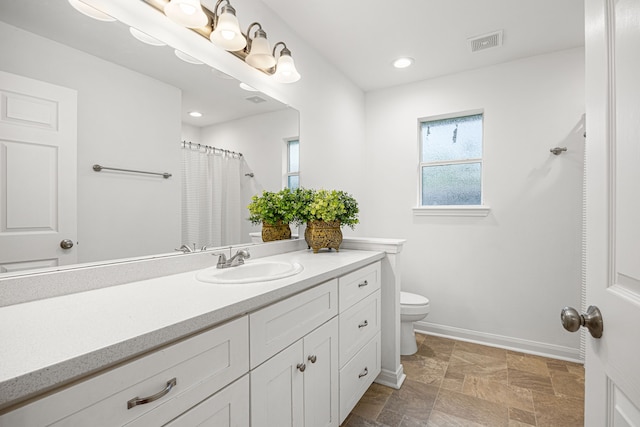 2206 Hollow Bloom Ln, Katy, TX 77494 - full bath with vanity, healthy amount of natural light, stone finish floors, recessed lighting, and a shower with shower curtain