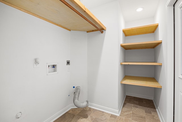 2206 Hollow Bloom Ln, Katy, TX 77494 - laundry area featuring electric dryer hookup, hookup for a gas dryer, washer hookup, stone finish flooring, and recessed lighting