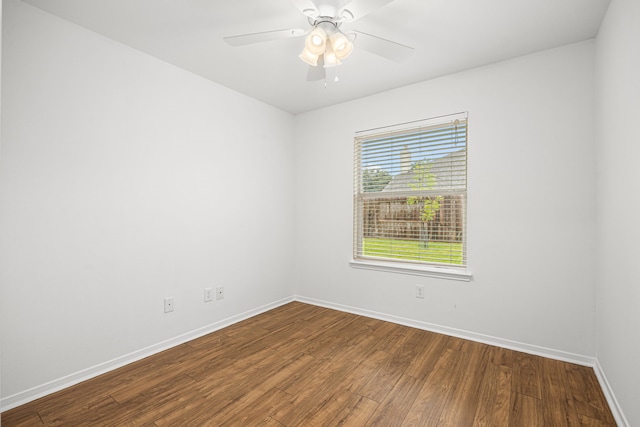 2206 Hollow Bloom Ln, Katy, TX 77494 - spare room featuring dark wood-style flooring and ceiling fan