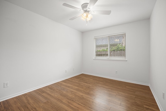 2206 Hollow Bloom Ln, Katy, TX 77494 - spare room with a ceiling fan and wood finished floors