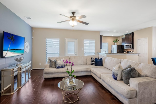 8218 Rustic Cape Dr, Cypress, TX 77433 - living area featuring a ceiling fan, dark wood-type flooring, and recessed lighting