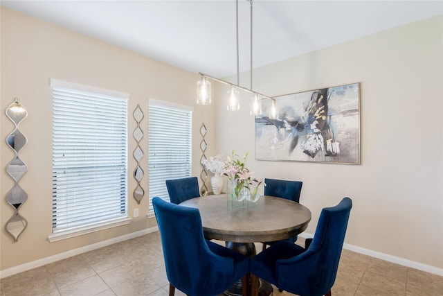 8218 Rustic Cape Dr, Cypress, TX 77433 - tiled dining area featuring baseboards