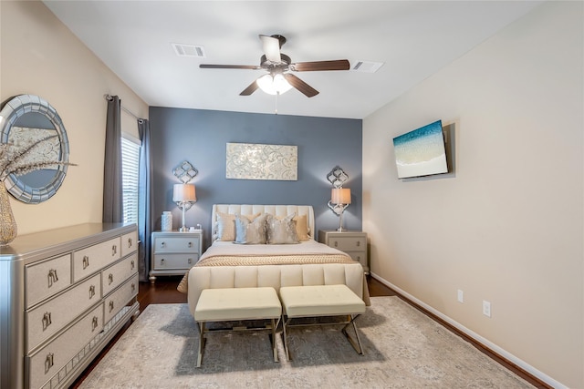 8218 Rustic Cape Dr, Cypress, TX 77433 - bedroom with wood finished floors and ceiling fan