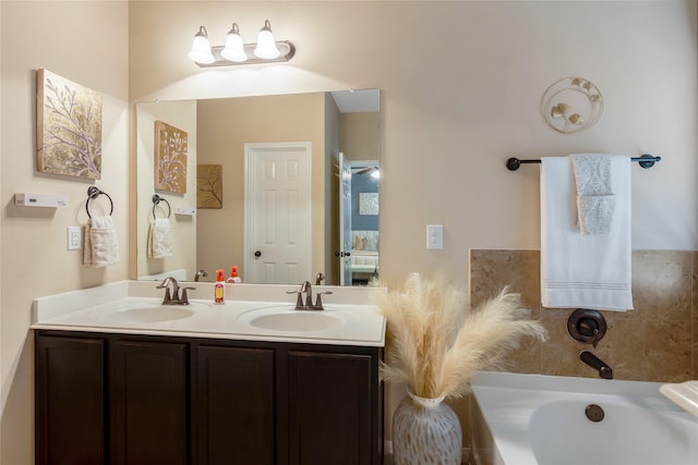 8218 Rustic Cape Dr, Cypress, TX 77433 - full bath featuring a bath and double vanity