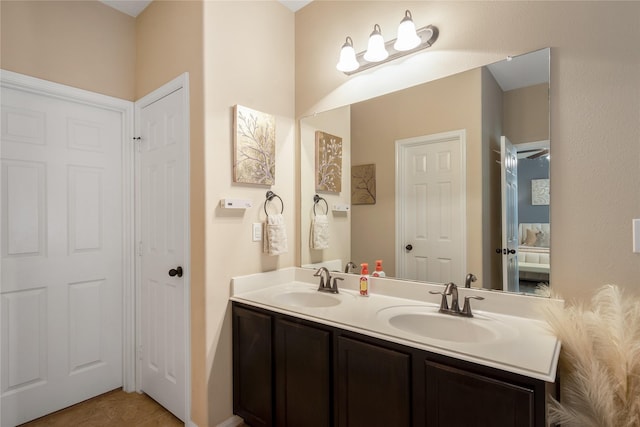 8218 Rustic Cape Dr, Cypress, TX 77433 - full bathroom with double vanity, tile patterned floors, and ensuite bathroom
