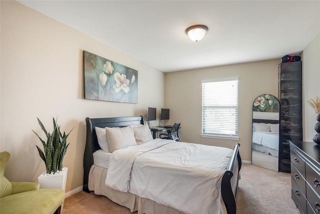 8218 Rustic Cape Dr, Cypress, TX 77433 - bedroom with light carpet and baseboards