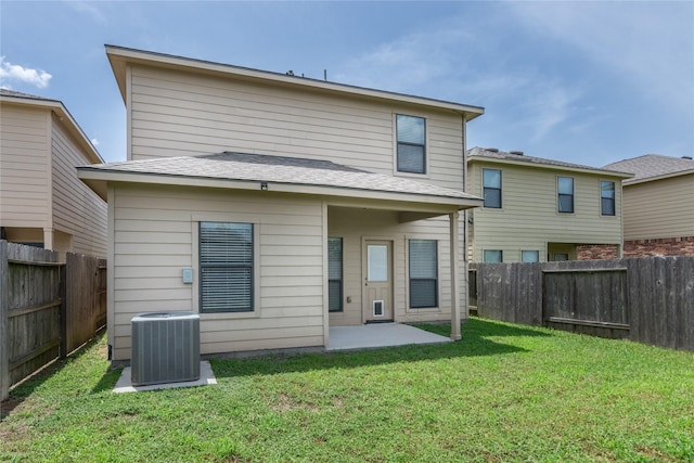 8218 Rustic Cape Dr, Cypress, TX 77433 - back of house with a fenced backyard and a patio area